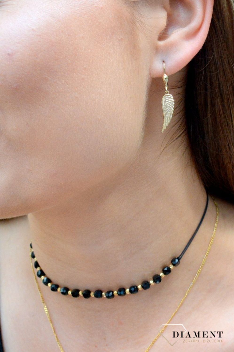 Złote kolczyki wiszące skrzydła próby 333 KL 9513A 333. Takie kolczyki będą niezwykłym prezentem dla kobiety interesującej się najnowszymi trendami. Na prezent . Modne kolczyki..jpg